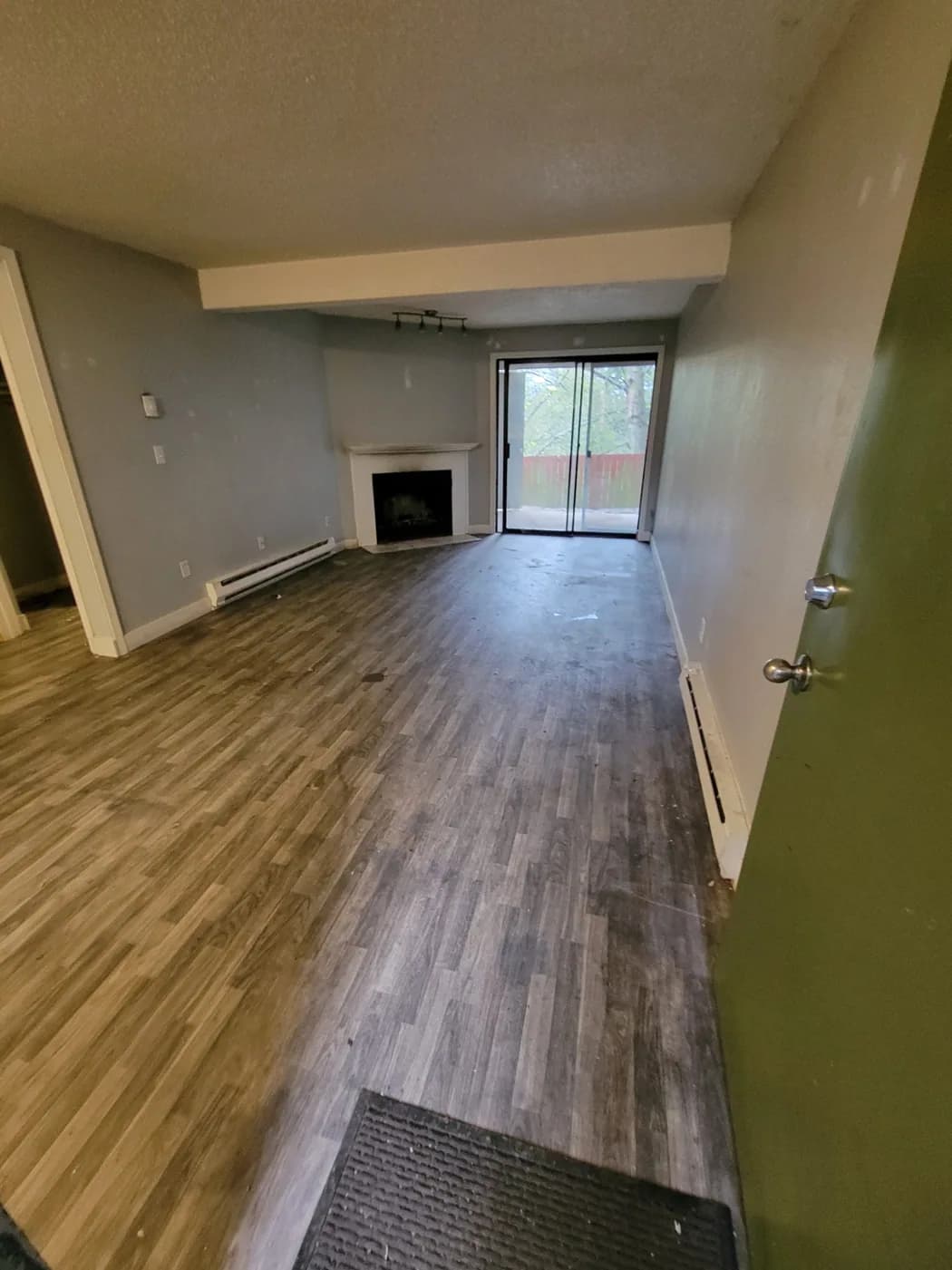 The same living room after the removal pile has been hauled away